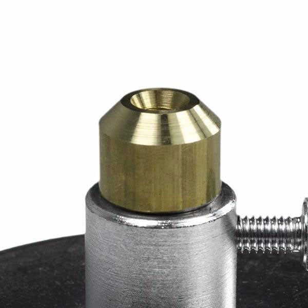 Gunther's metal insert, shown seated in the magnetic base, positions the drill bit's counter part for stable hole drilling.